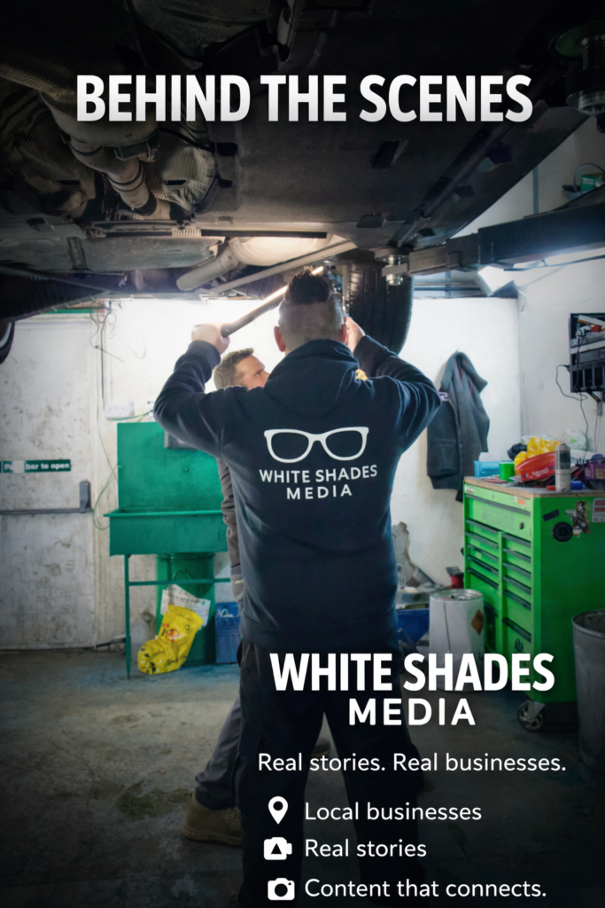 White Shades Media behind-the-scenes poster showing filming under a vehicle in a garage